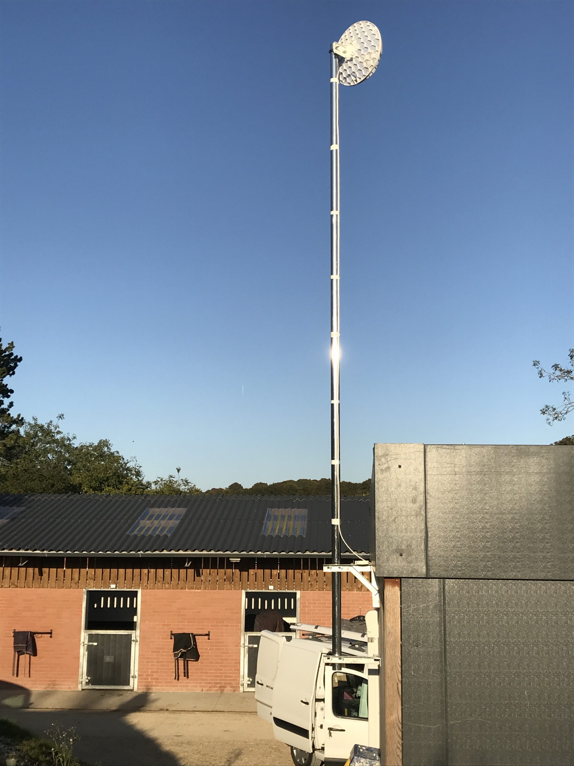 4G antenna installation in a horse yard, providing rural broadband connectivity to enhance communication and internet access in remote areas.
