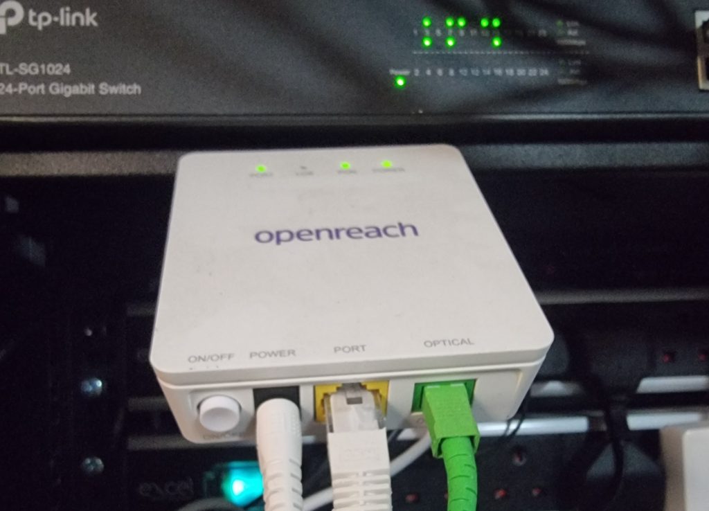 An Optical Network Terminal (ONT) typically features various ports including Ethernet ports for connecting devices, a WAN port for internet connectivity, phone ports for voice services, and sometimes coaxial ports for TV signal transmission, facilitating versatile communication options.